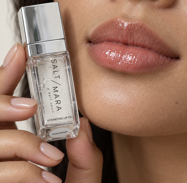 Saltmara Coconut Hydrating Lip Oil with a glassy finish